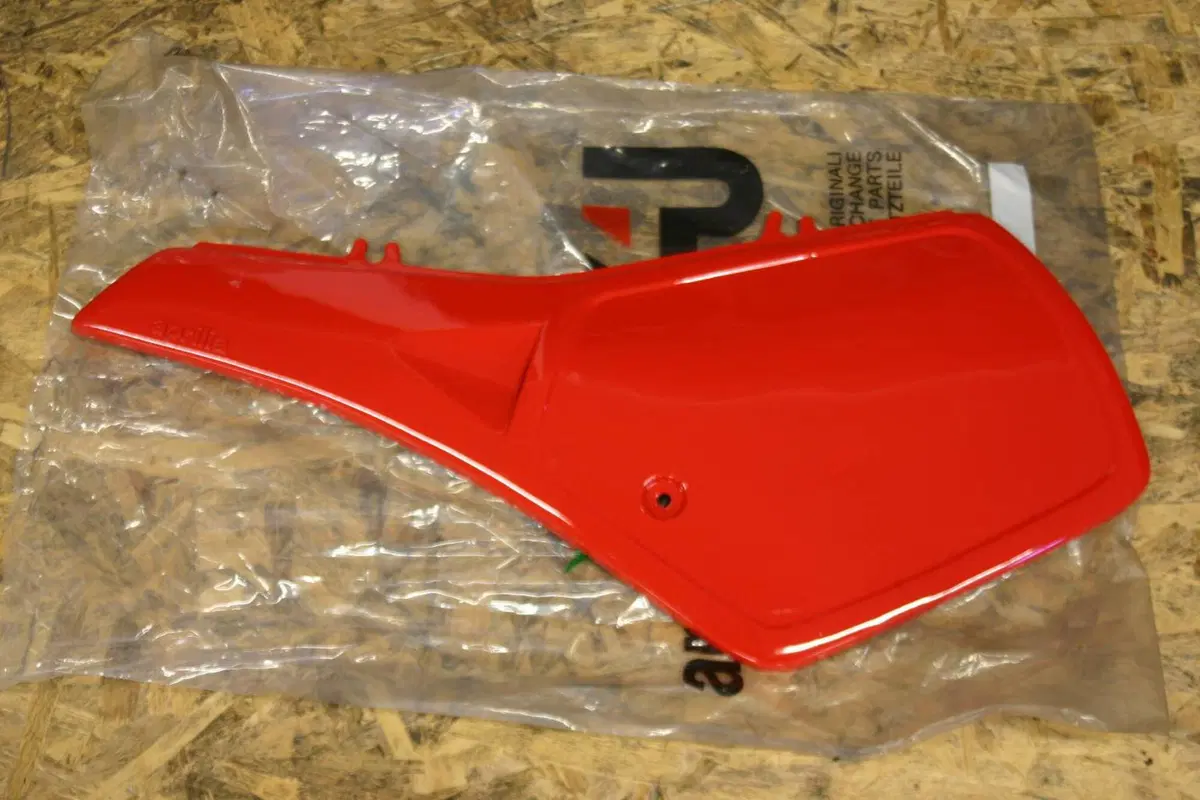 FIANCATINA SX ROSSA Aprilia Tuareg 125