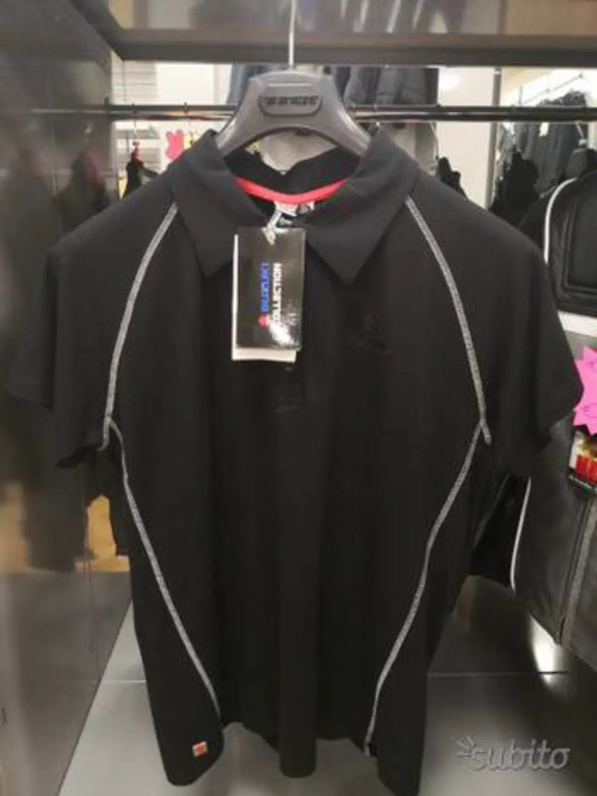 Polo Suzuki nera Dainese