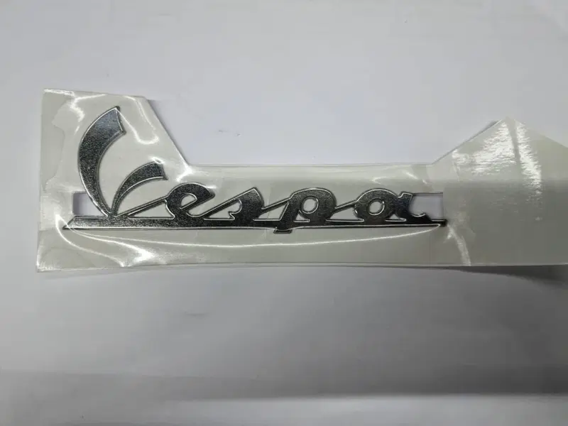 TARGHETTA EMBLEMA ADESIVO PIAGGIO VESPA - 1B000944