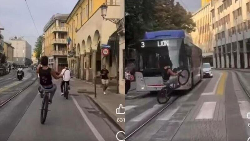 Padova, impenna in bici contromano schivando gli autobus. Il modo giusto per farsi molto male [VIDEO]