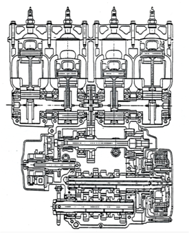 Questa sezione del motore Yamaha TZ 750 a quattro cilindri (largamente impiegato dai nostri piloti di punta) consente di osservare chiaramente le principali caratteristiche costruttive come i due alberi a gomiti di tipo composito in presa con l’ingranaggio dell’albero ausiliario, collocato centralmente, e gli otto cuscinetti di banco