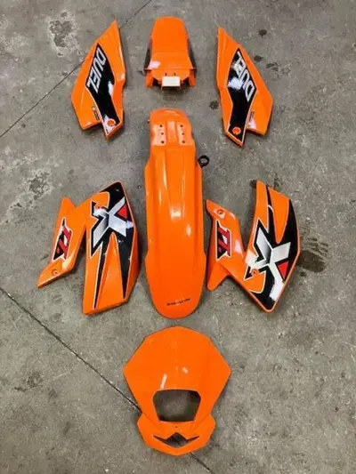 Kit plastiche arancio NUOVE ! Roxon-Nox 50cc. Due