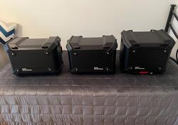 Perfetto tris valigie elettrificate originali nero BMW