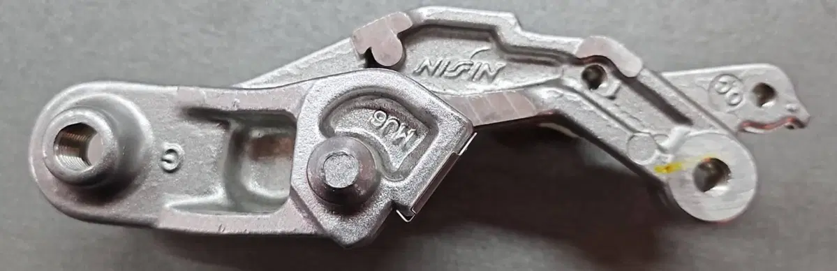 45110MJ6016 Supporto pinza freno NS400 Nissin