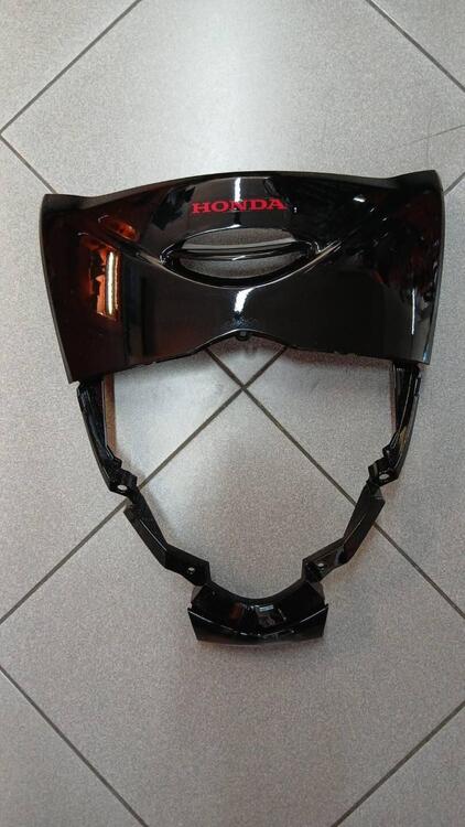 64300KTF910ZA Mascherina anteriore SH 125/150 Honda