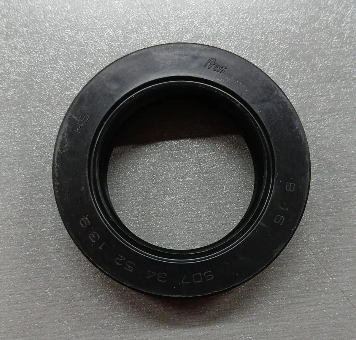91205KE8003 Paraolio 34x52x13 Honda (2)