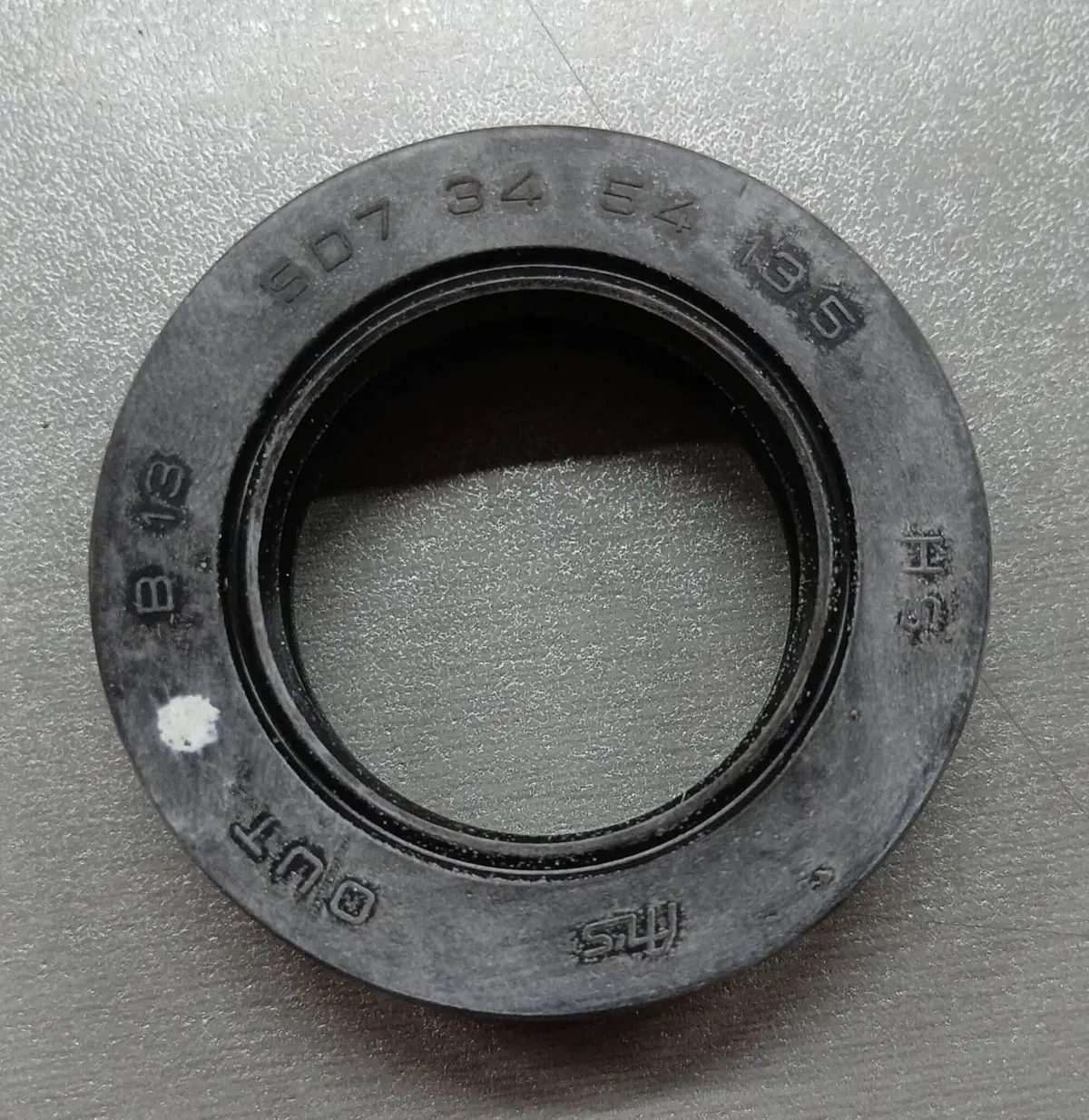 91205MA6003 paraolio 34x54x13.5 Honda