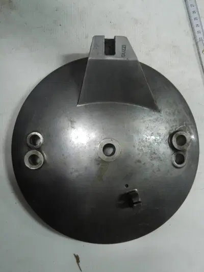 Tamb. portaceppi senza leveraggi + coprimozzo VV Moto Guzzi